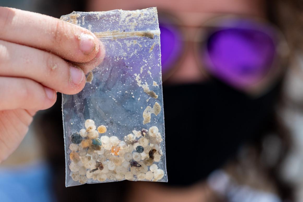 bag with nurdles collected from beach