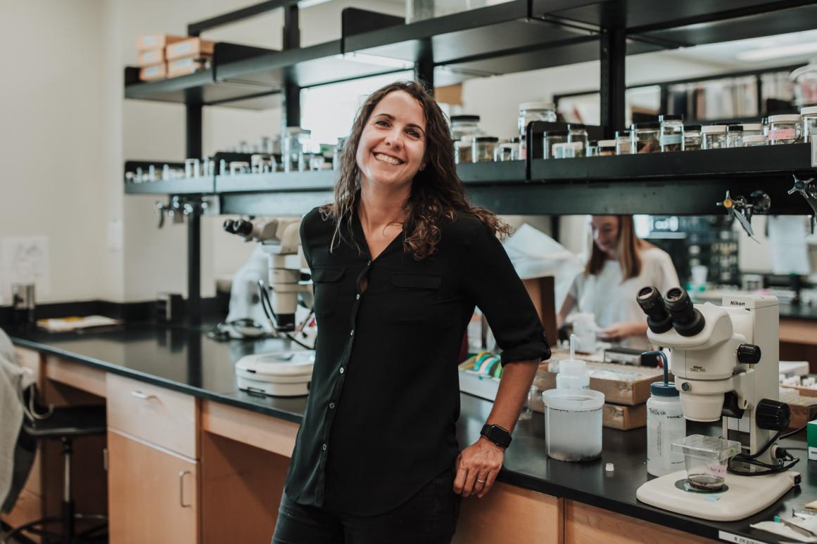 Dr. Jennifer Pollack standing in her lab